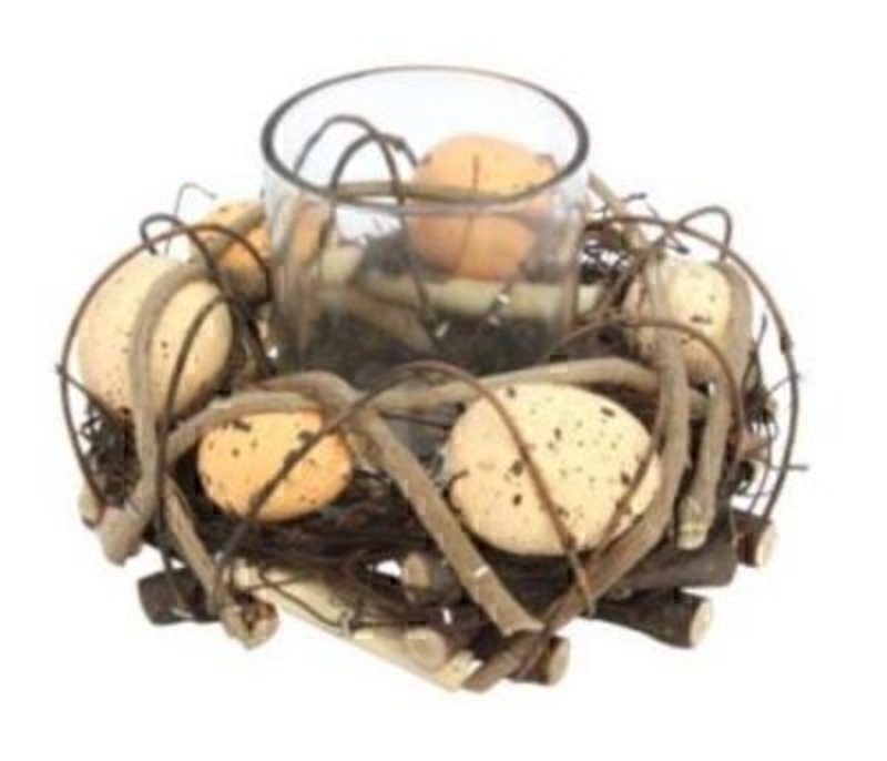 Add some Easter decorations to your home with this Easter Twig Nest with Eggs Tea Light Holder Table Centrepiece by Gisela Graham. Perfect for Easter table decorations and or you could add to any other Easter home dÃ©cor to bring some Easter fun to the room. With a central glass jar as the tea light holder this Easter Nest is made from wooden twigs and decorated with speckled eggs. Size: (LxWxD) 15x15x9.5cm